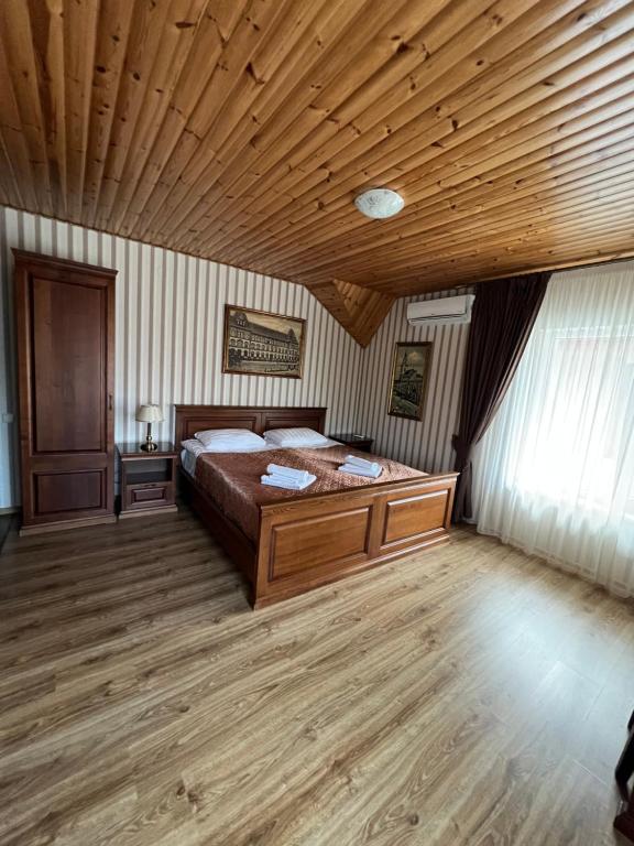 Postel nebo postele na pokoji v ubytování Guest House Villa Lamperti