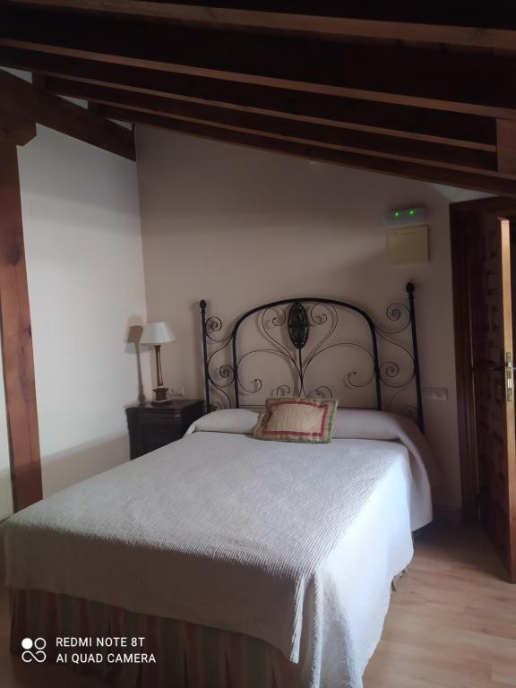 Postel nebo postele na pokoji v ubytování Hotel la posada de Numancia