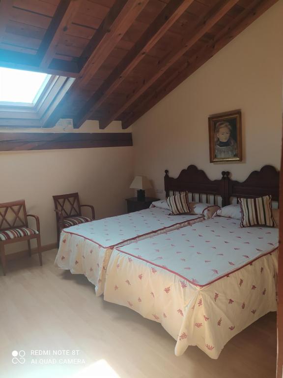 Postel nebo postele na pokoji v ubytování Hotel la posada de Numancia