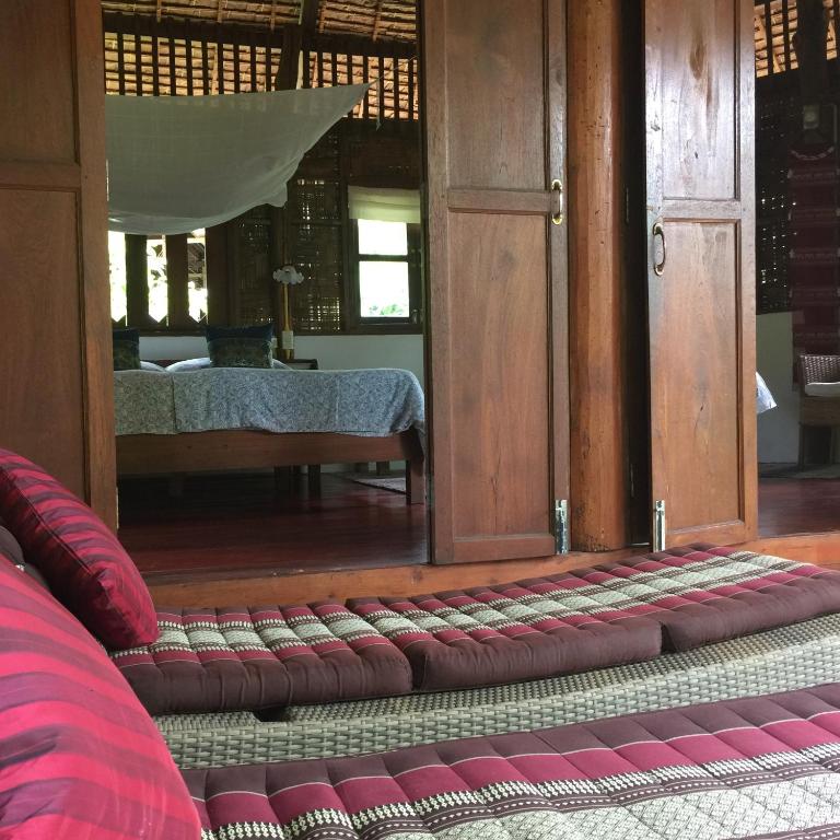 Ein Bett oder Betten in einem Zimmer der Unterkunft Sang Tong Huts