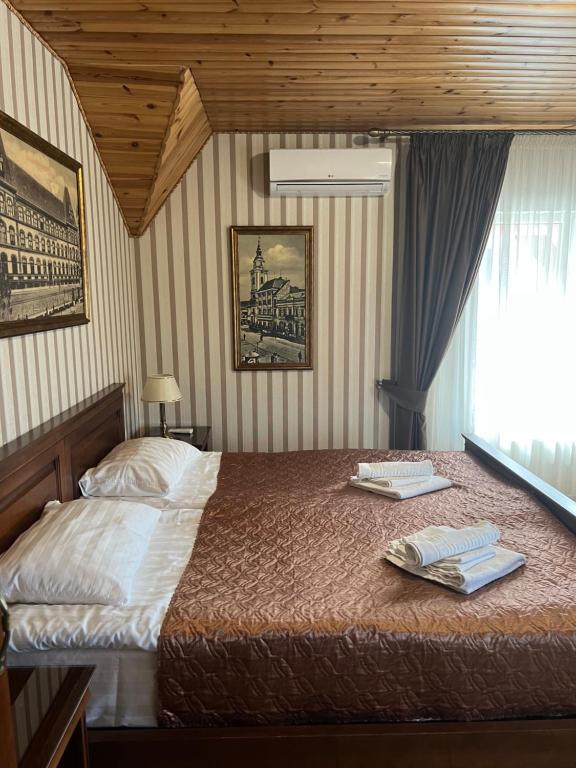 Postel nebo postele na pokoji v ubytování Guest House Villa Lamperti