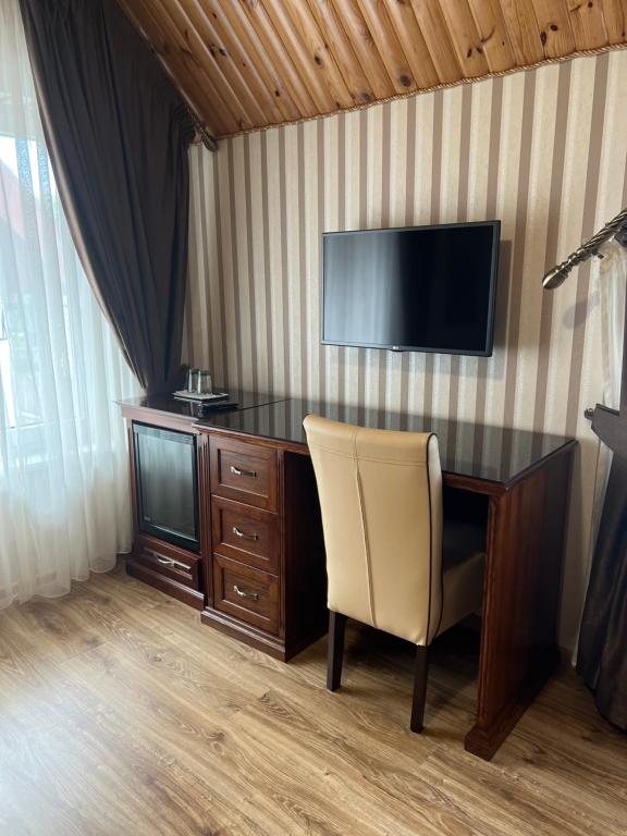 TV a/nebo společenská místnost v ubytování Guest House Villa Lamperti