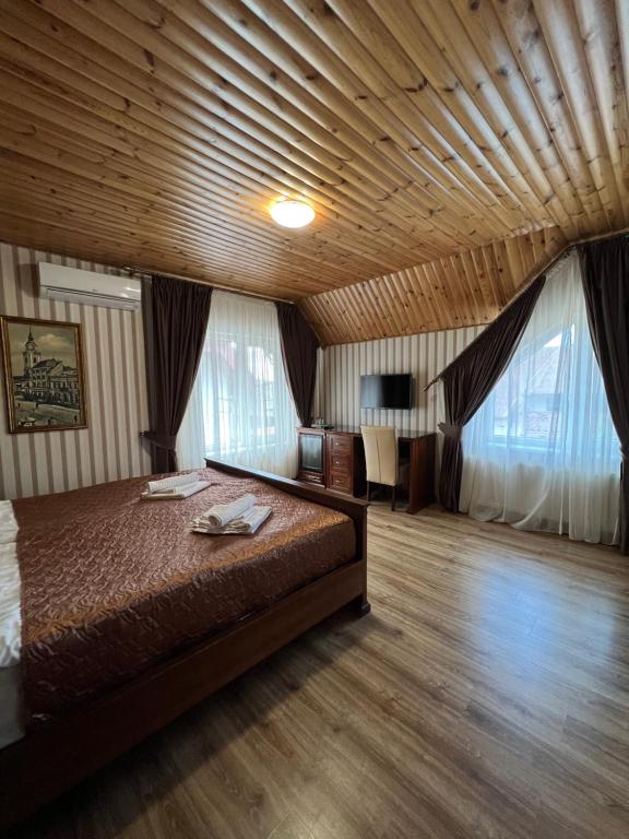 Postel nebo postele na pokoji v ubytování Guest House Villa Lamperti