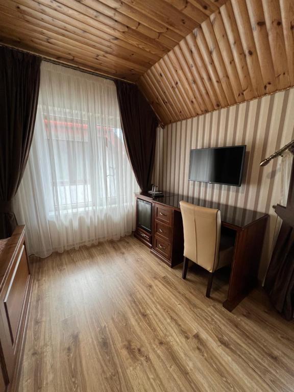 TV a/nebo společenská místnost v ubytování Guest House Villa Lamperti