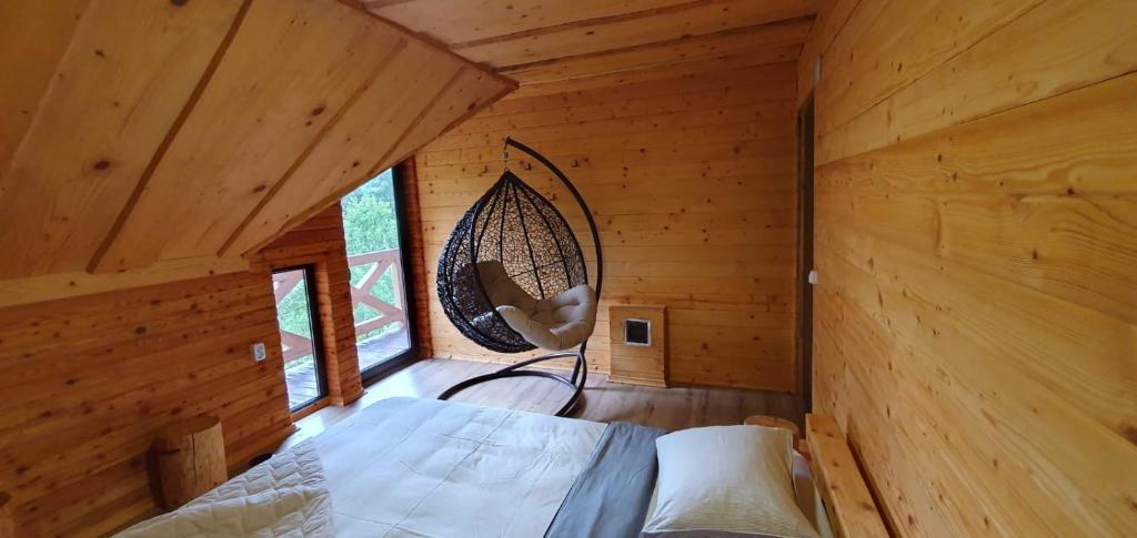 Postel nebo postele na pokoji v ubytování Котедж Гук