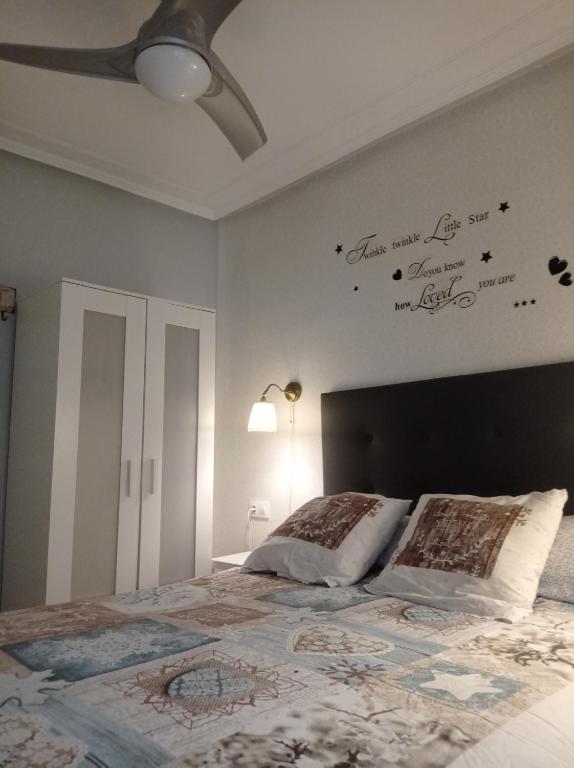 Postel nebo postele na pokoji v ubytování Serendipia Apartamentos 1