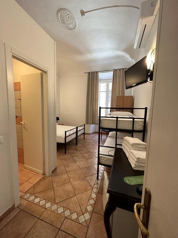 Postel nebo postele na pokoji v ubytování Hotel Il Papavero