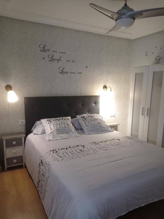 Postel nebo postele na pokoji v ubytování Serendipia Apartamentos 1