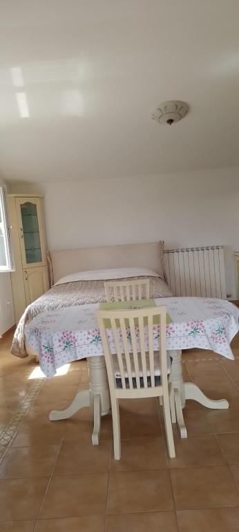 Postel nebo postele na pokoji v ubytování Apartma Barižoni