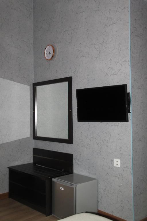TV a/nebo společenská místnost v ubytování Hotel 1883