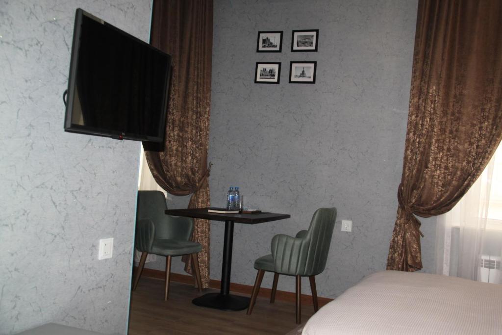 TV a/nebo společenská místnost v ubytování Hotel 1883