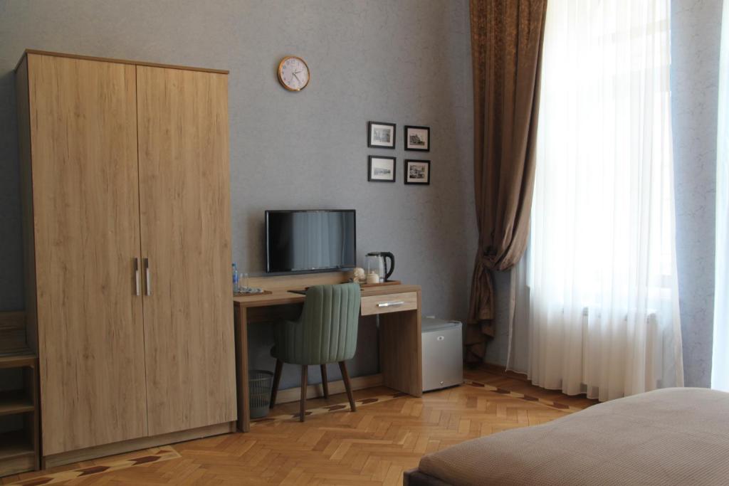 TV a/nebo společenská místnost v ubytování Hotel 1883