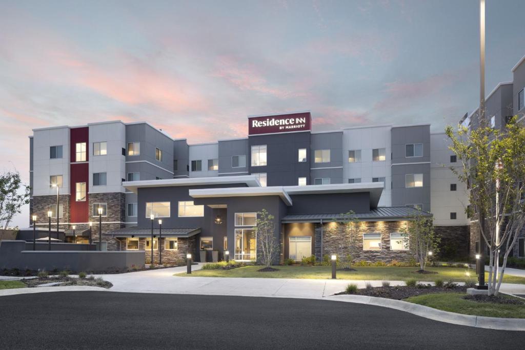 a hospital building with a sign on top of it at Residence Inn by Marriott Jonesboro in Jonesboro