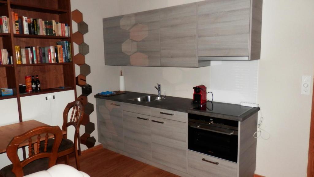 Kuchyň nebo kuchyňský kout v ubytování Chalet Mund