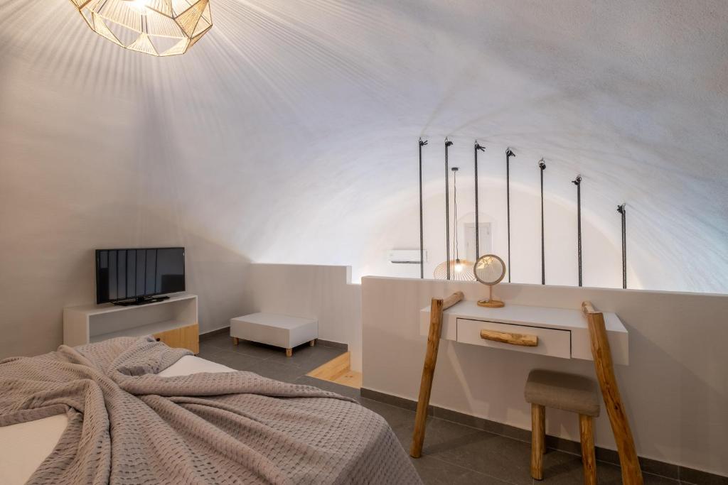 Postel nebo postele na pokoji v ubytování CABO ESTE SUITES