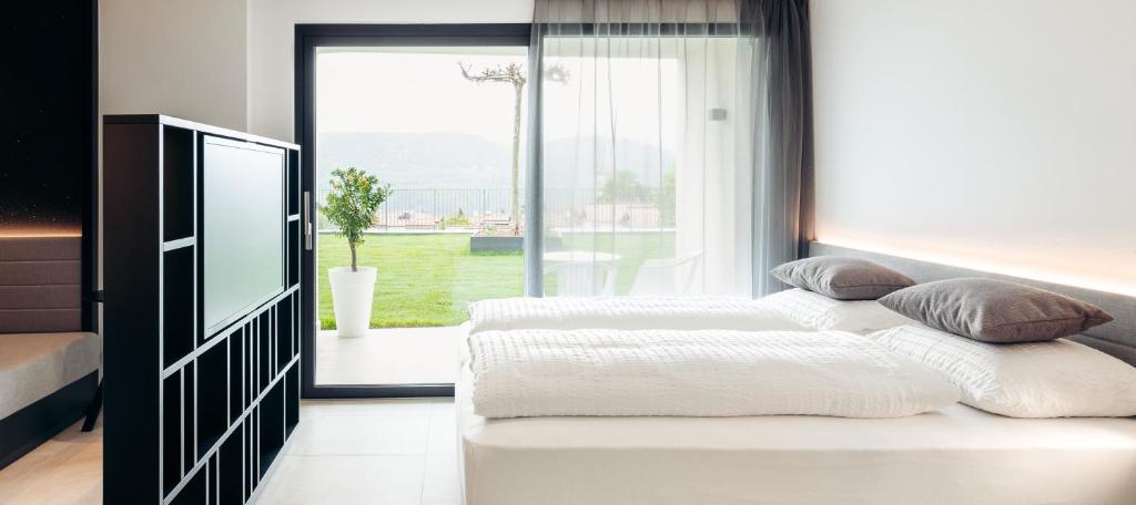 Postel nebo postele na pokoji v ubytování Villa Weingarten
