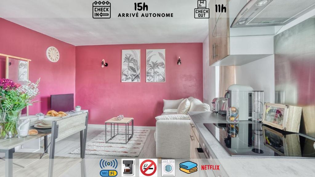 a kitchen with pink walls and a living room at Le Rubis de Gonesse •CDG•Parc Expo•Astérix in Gonesse