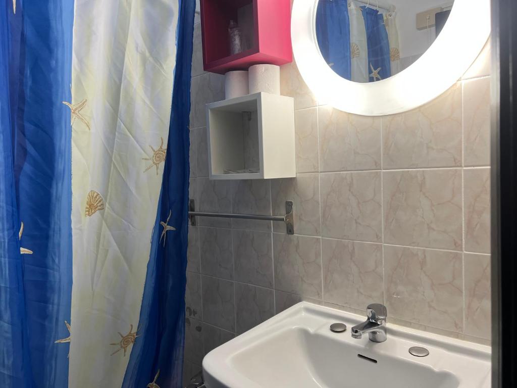 Koupelna v ubytování X Hotel