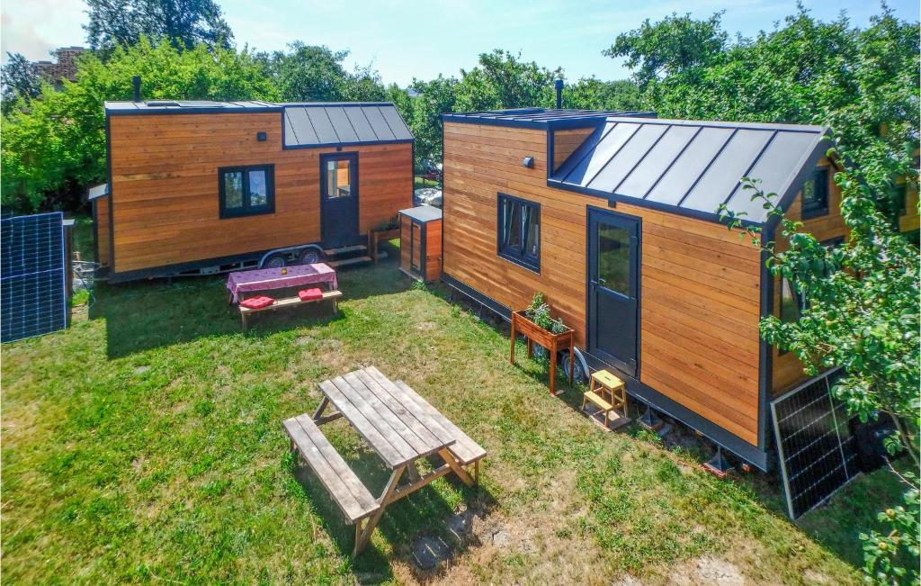 an aerial view of a tiny house with a picnic table at Awesome Home In Mayrhof With Wifi And 1 Bedrooms 