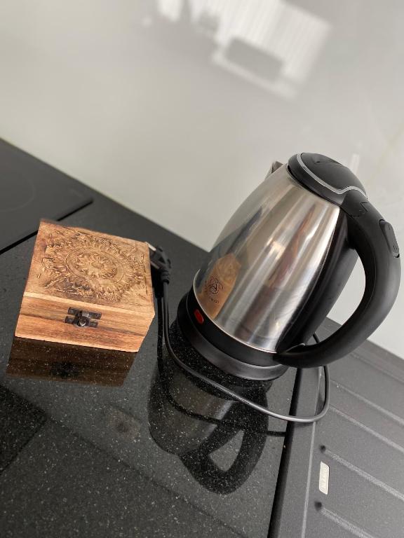 Set per la preparazione di tè e caffè presso Zwarte Arend AirBnB