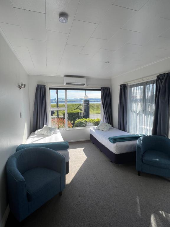 Postel nebo postele na pokoji v ubytování Accent On Taupo Motor Lodge