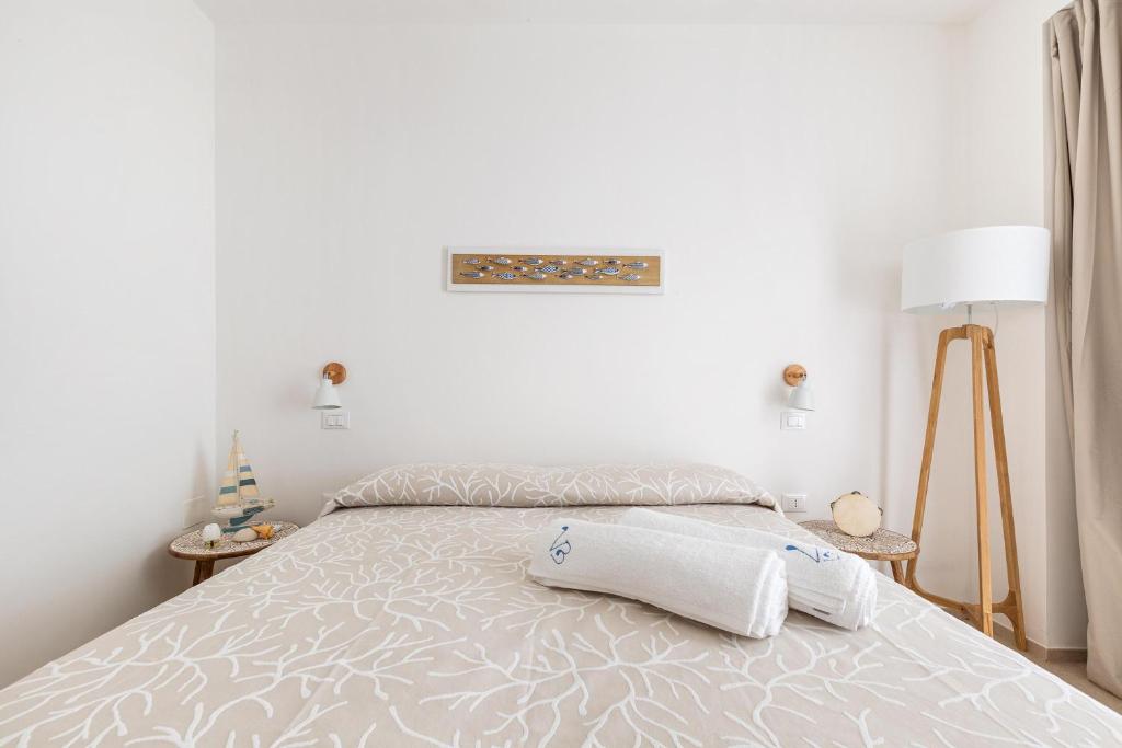Postel nebo postele na pokoji v ubytování Villa Briosa Maldive del Salento Pescoluse