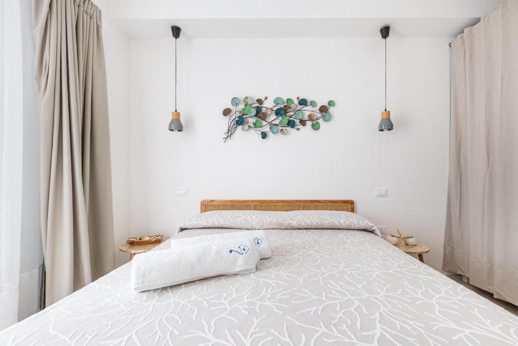 Postel nebo postele na pokoji v ubytování Villa Briosa Maldive del Salento Pescoluse