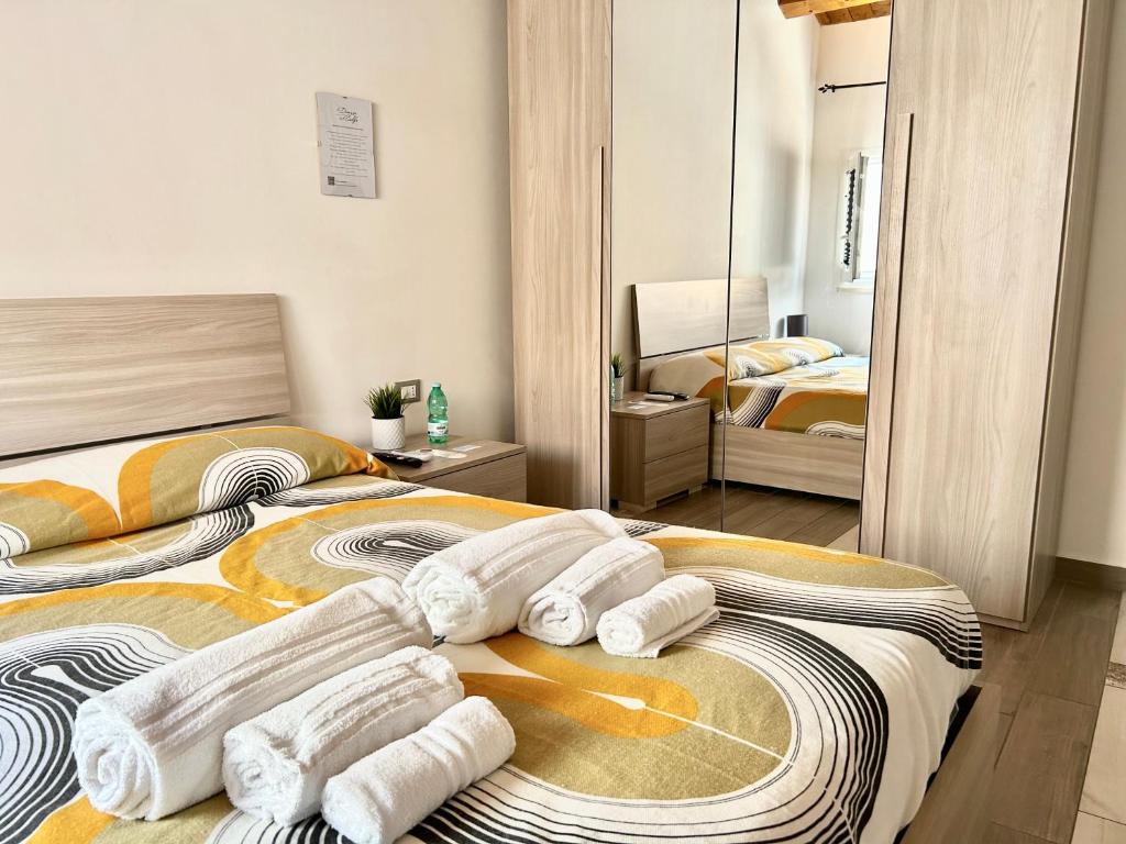 Кровать или кровати в номере La Dimora del Golfo