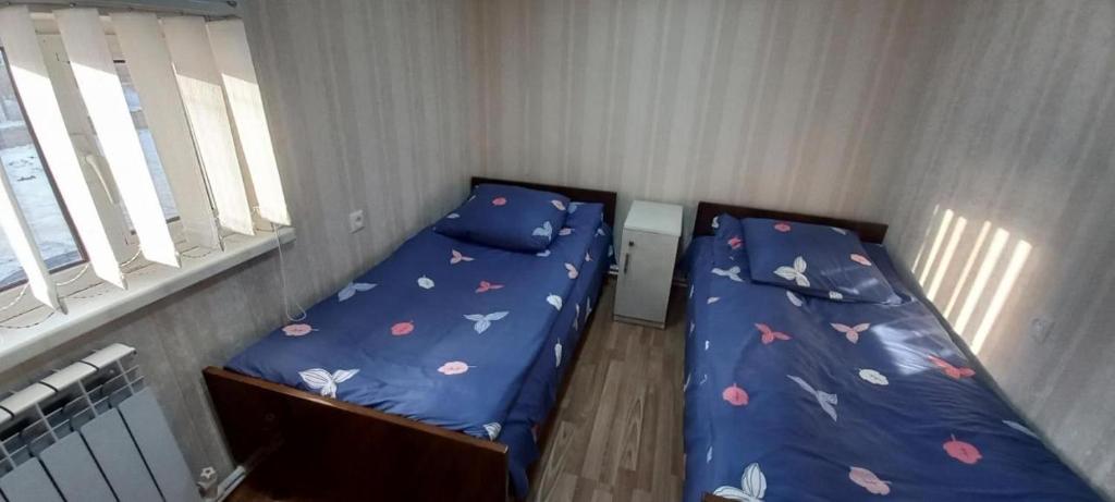 Postel nebo postele na pokoji v ubytování Dream House & Hostel