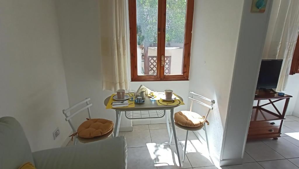 TV a/nebo společenská místnost v ubytování Le Peonie Guest House