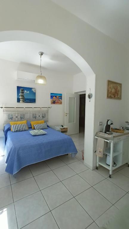 Postel nebo postele na pokoji v ubytování Le Peonie Guest House