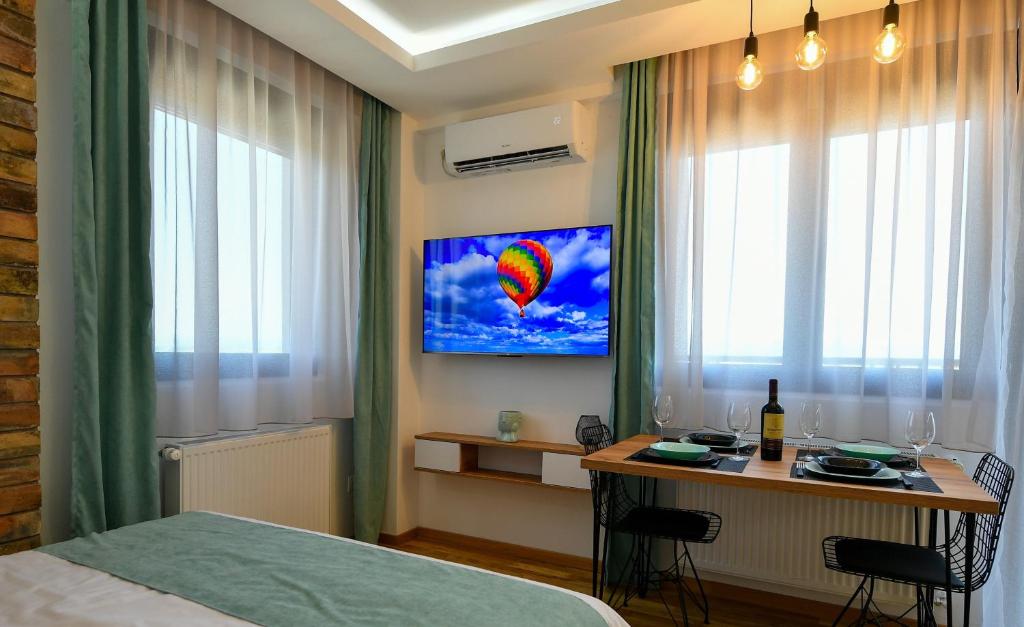 TV a/nebo společenská místnost v ubytování Lux Apartman Petrovic