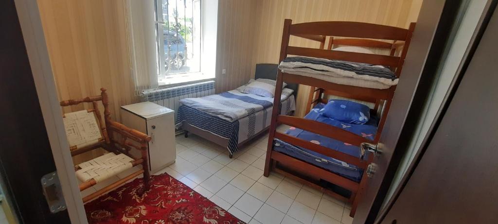 Postel nebo postele na pokoji v ubytování Dream House & Hostel