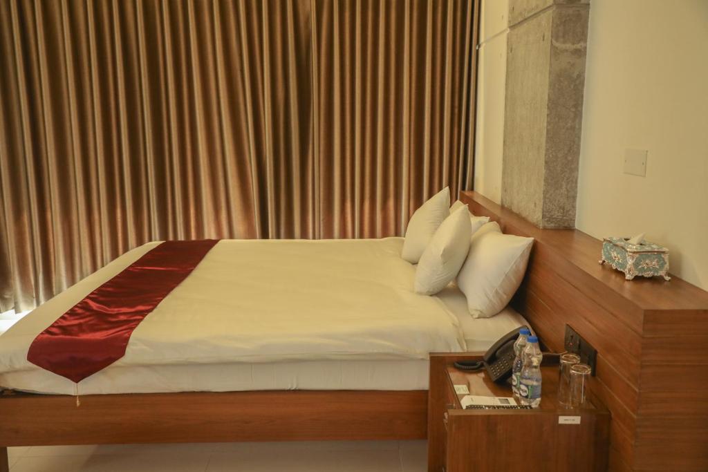 מיטה או מיטות בחדר ב-JAKAS Resource Center