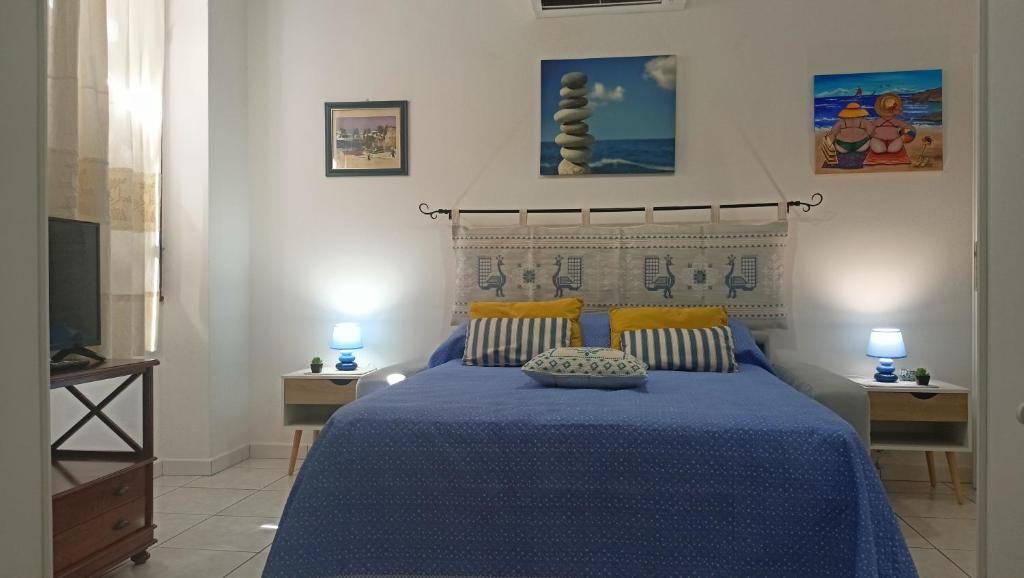 Postel nebo postele na pokoji v ubytování Le Peonie Guest House