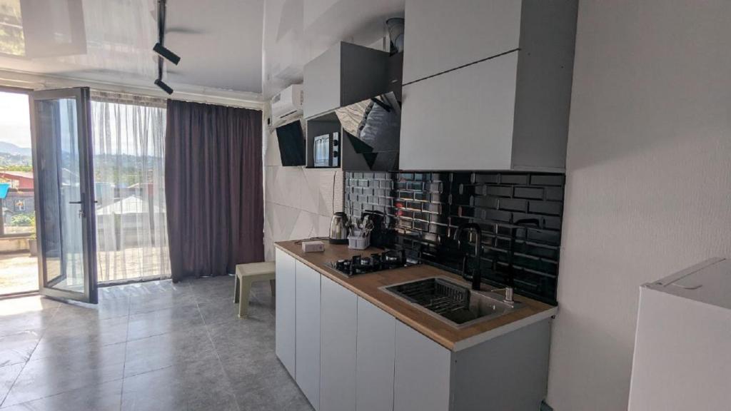 Kuchyň nebo kuchyňský kout v ubytování Tirkius House