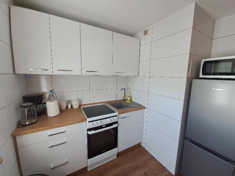 Η κουζίνα ή μικρή κουζίνα στο Apartament na Słoneczników