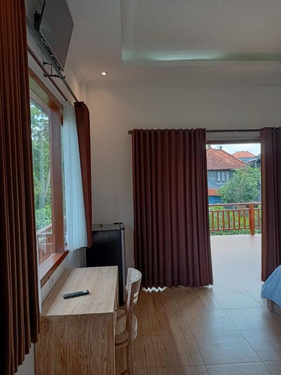 TV a/nebo společenská místnost v ubytování Karma House