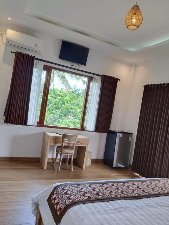 Postel nebo postele na pokoji v ubytování Karma House