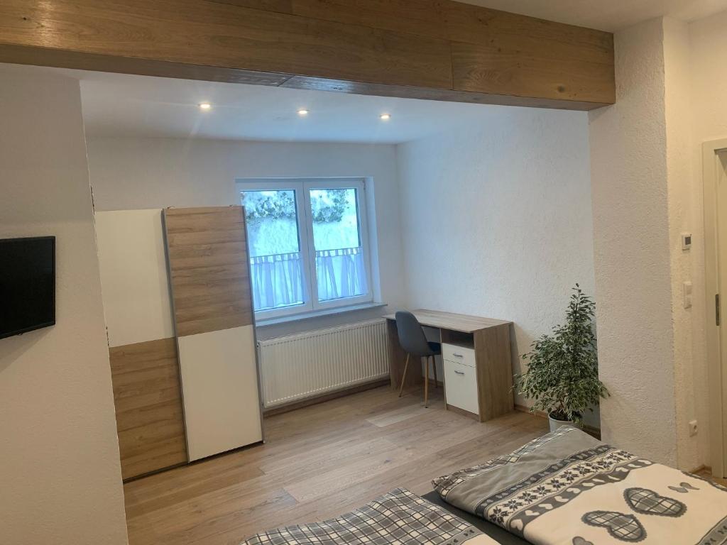 Postel nebo postele na pokoji v ubytování Allgäu Loft Obermaiselstein