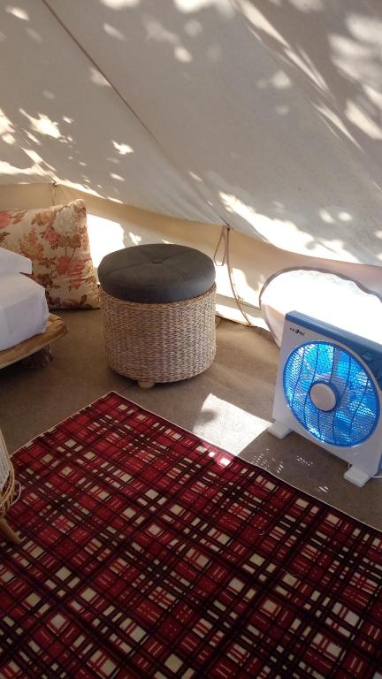 Voodi või voodid majutusasutuse Yurta con uso piscina e vista meravigliosa toas