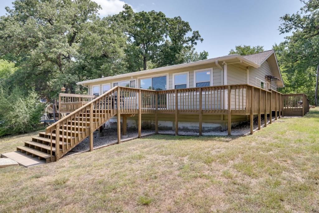 a large manufactured home with a large deck at Lakefront College Station Home Near Texas A and M! in College Station