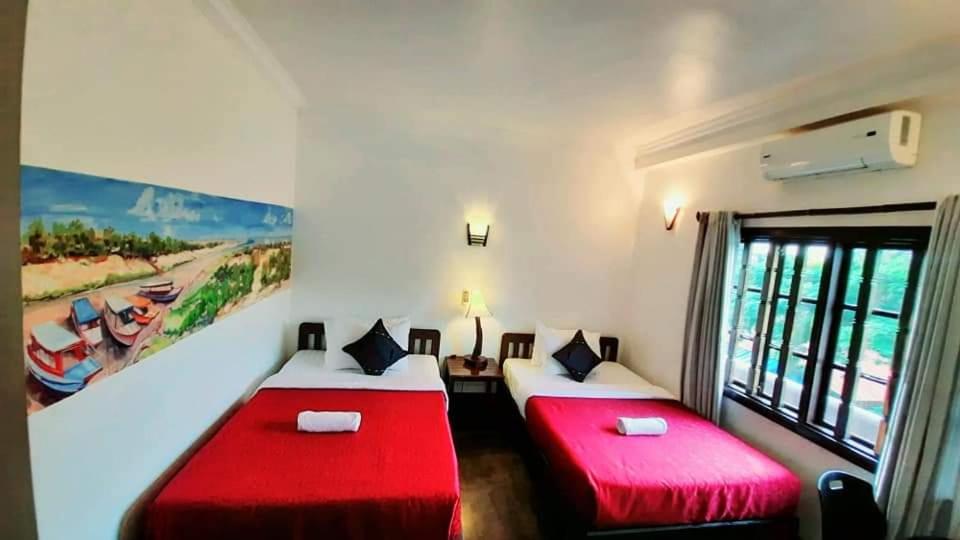 Postel nebo postele na pokoji v ubytování Uncle Sam Villa