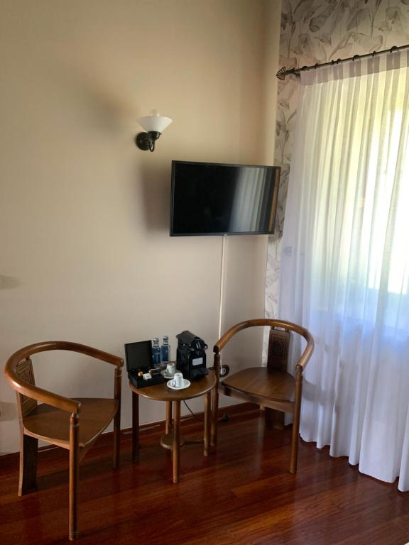 Televízia a/alebo spoločenská miestnosť v ubytovaní Casa de Costoia