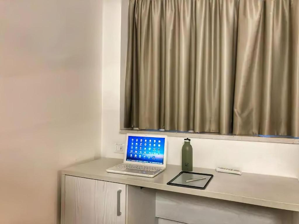 TV a/nebo společenská místnost v ubytování Hotel Villa Argia Rimini Marina Centro