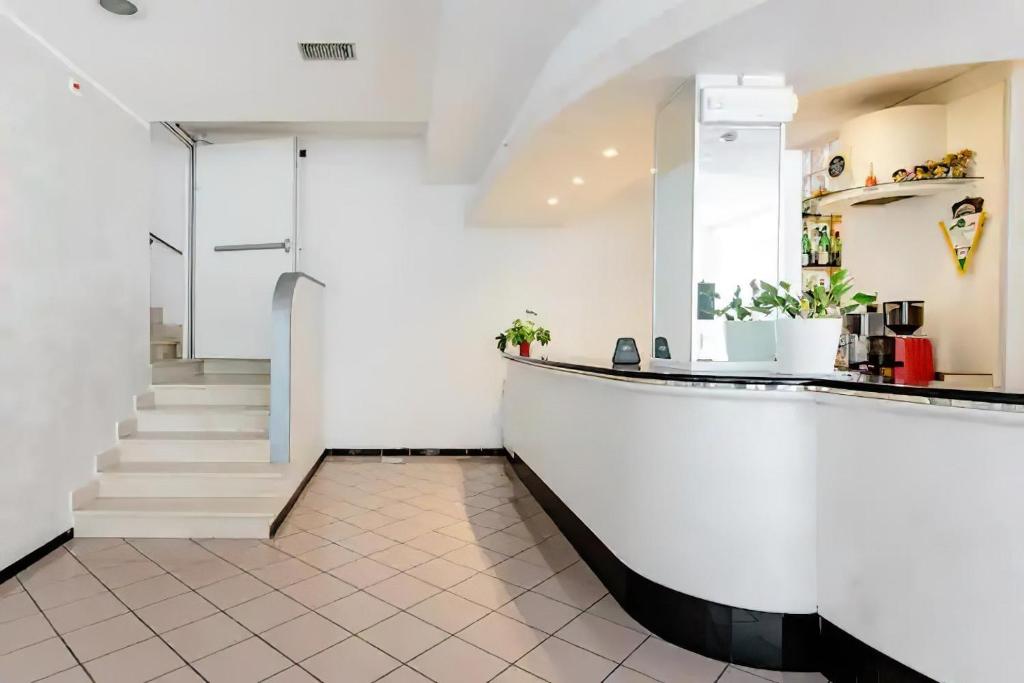 Kuchyň nebo kuchyňský kout v ubytování Hotel Villa Argia Rimini Marina Centro