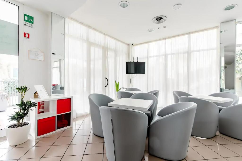 TV a/nebo společenská místnost v ubytování Hotel Villa Argia Rimini Marina Centro