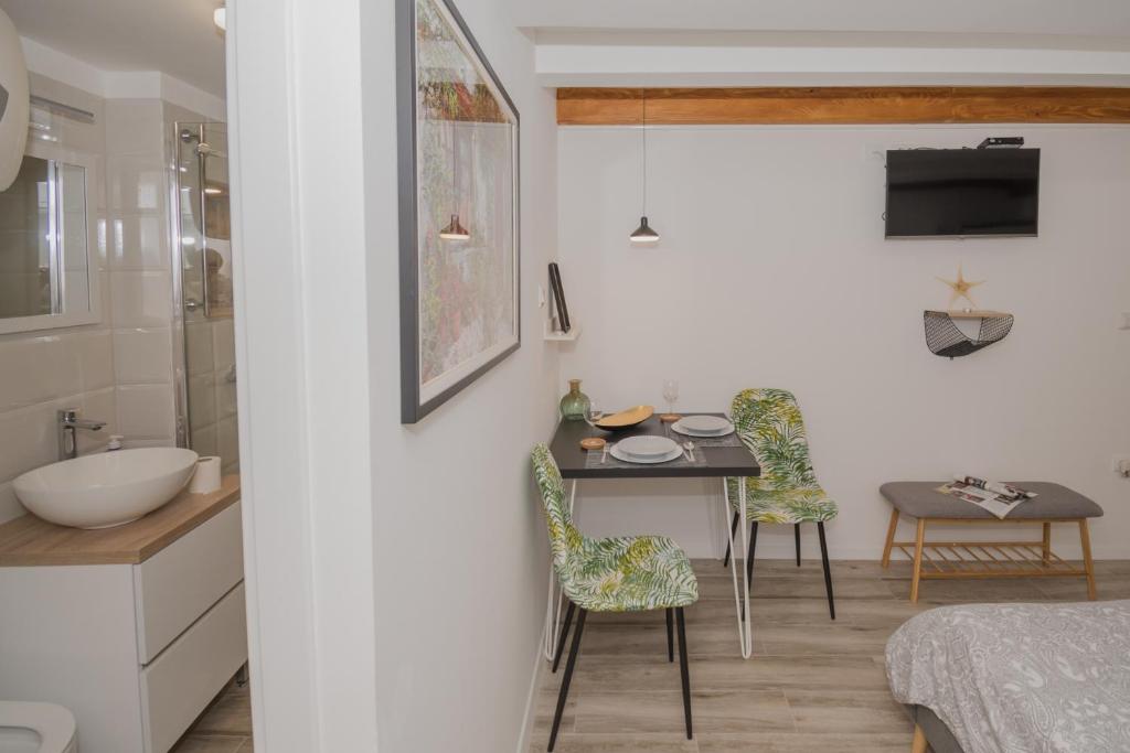 Postel nebo postele na pokoji v ubytování DeCoR Kut