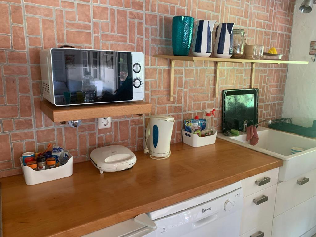 Kuchyň nebo kuchyňský kout v ubytování Villa Monte dos Pinheiros