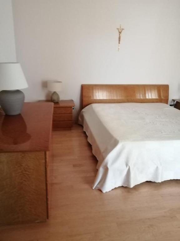 Postel nebo postele na pokoji v ubytování B&B dei Girasoli